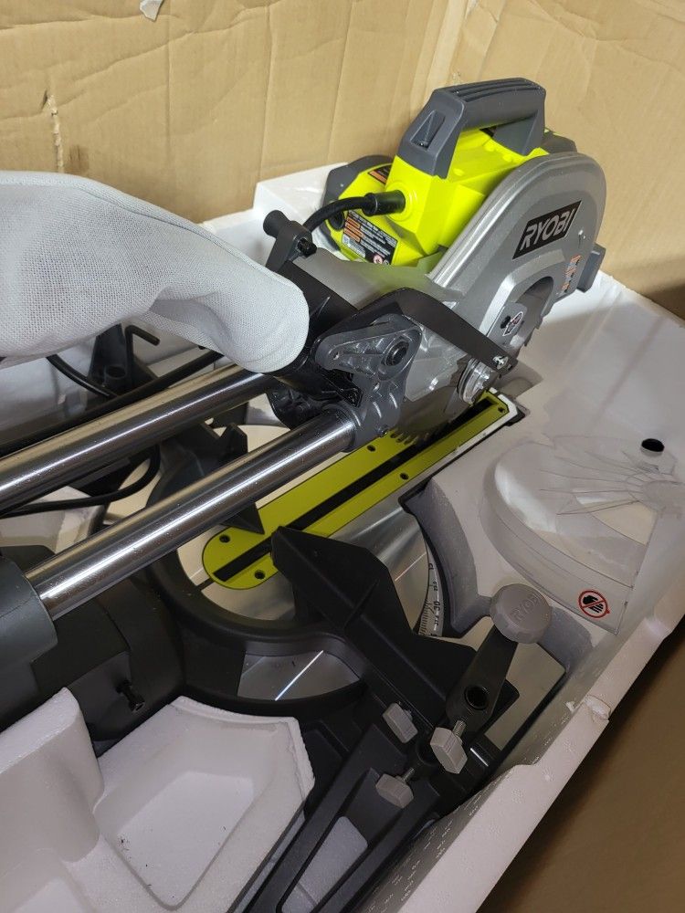 RYOBI CORDED 12"IN SLIDING MITER SAW has A Plastic Broken Works Perfectly