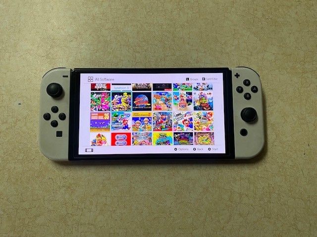 Switch Oled with 120 Switch Games and 7000 Classic Arcade Games