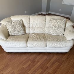 Leather couch, leather chair and ottoman