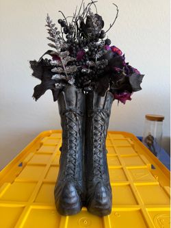 Black witches shoe with black floral vase