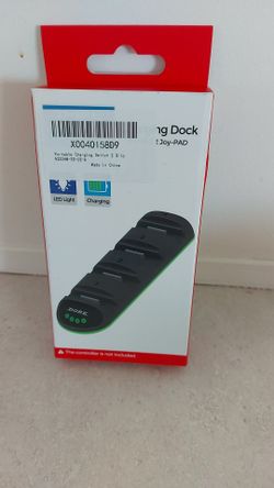Portable charging dock for NS