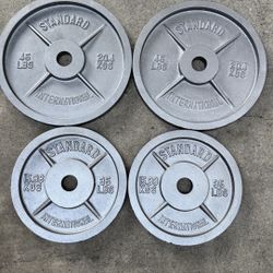 Pairs Of 35 And 45 Pound Olympic Standard International Weights