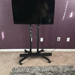32” Tv With Stand And Remote 