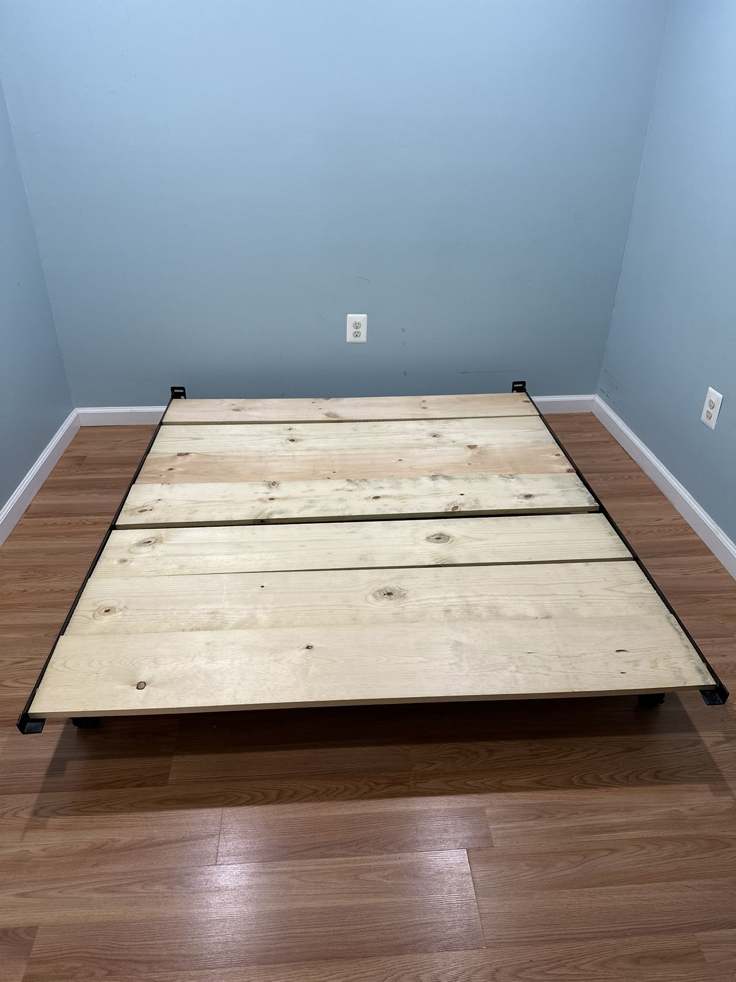 Queen size metal frame with optional extra wood sheets