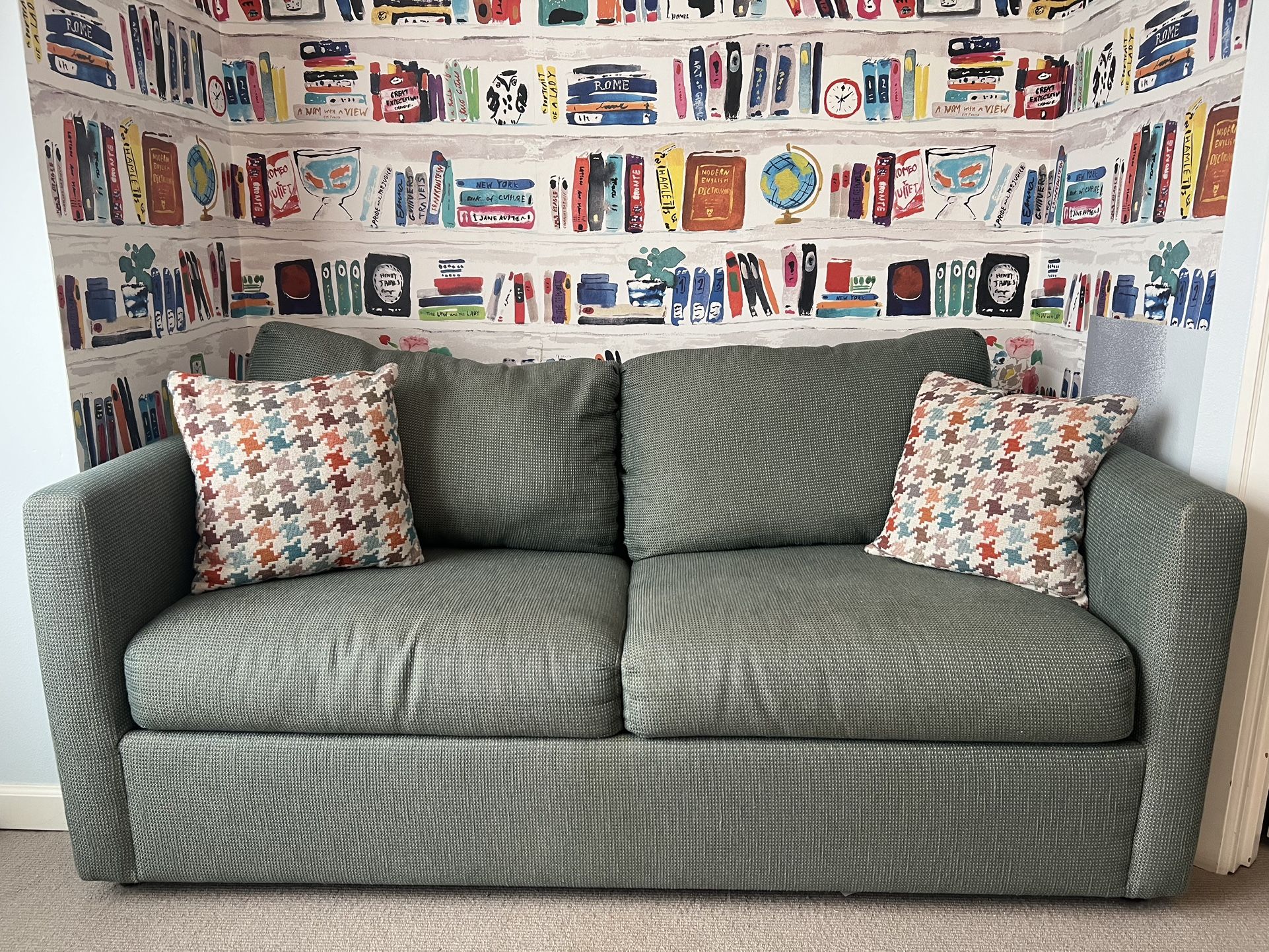 Full Size Sleeper Sofa with Patterned Cushions in Excellent Condition