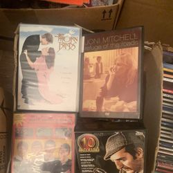 130. Cds.  135 DVDs. 