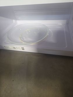 Ge white above the stove microwave