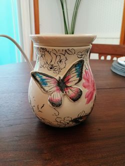Butterfly electric wax warmer