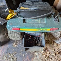 two older riding lawn mowers I believe they thay can start+extras