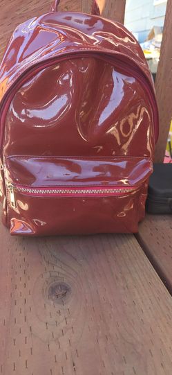 Mochila guinda $5