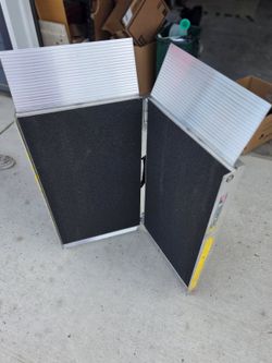 Heavy steel curb ramp