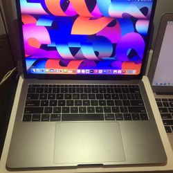 MacBooks, iPad And Phones