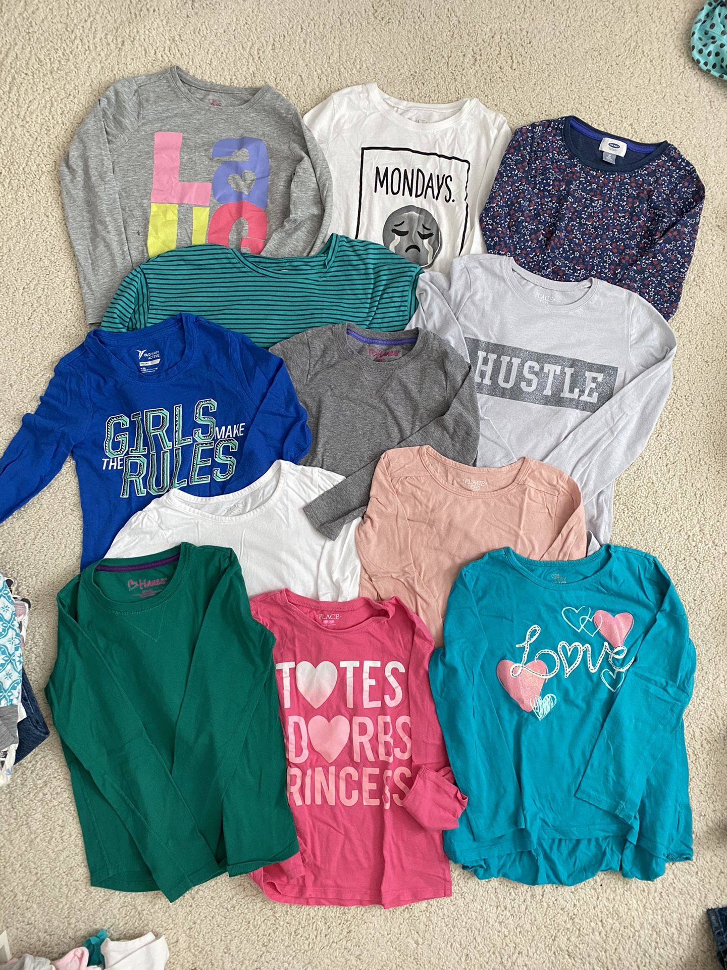 Girls long sleeve shirts, sizes 7-8, $1 each