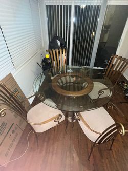 Glass dinner table with 4 chairs