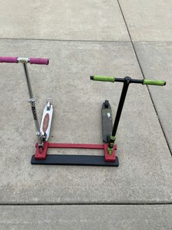 2 Scooters With Stand