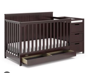 baby crib with changing table
