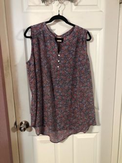 Women’s Size 2X (18 / 20) SleevelessTop.  Made of 65% Rayon and 35% Polyester.  Brand Faded Glory.  Preowned good condition.