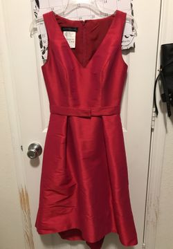 Dress. Color is Sangria. Size 2. Longer in the back.