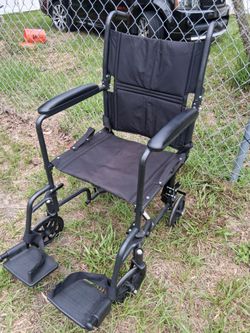 NICE  FOLDABLE WHEEL CHAIR