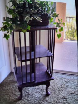 Antique bookshelf made out of wood turns around, perfect, very old