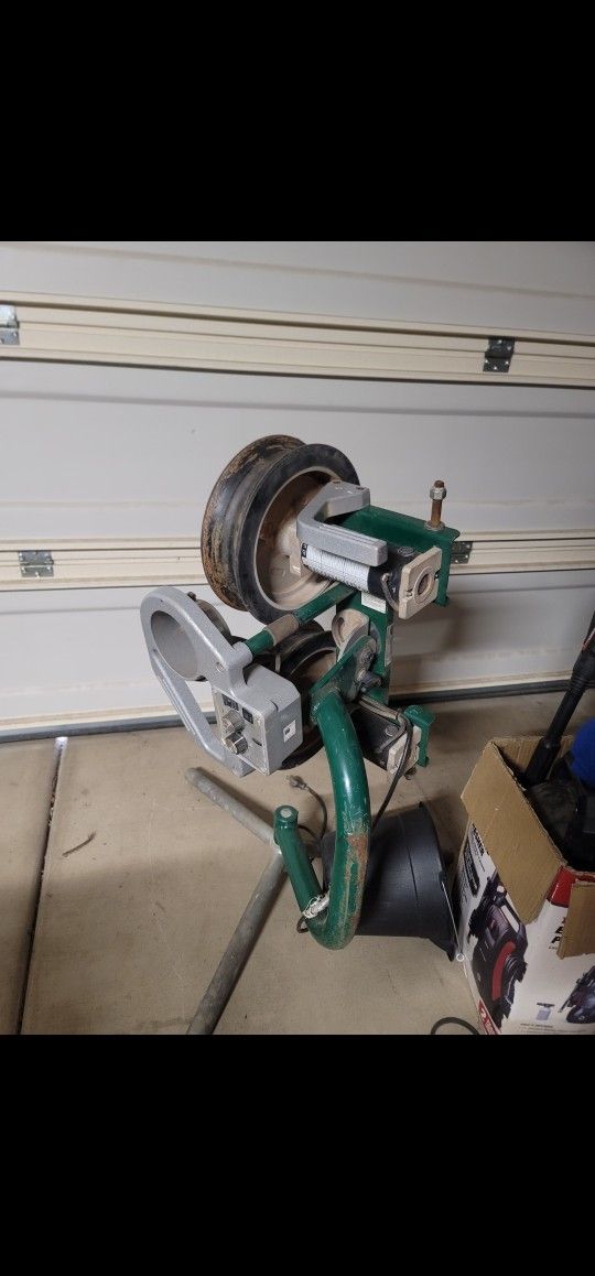 Softball Equipment And Pitching Machine