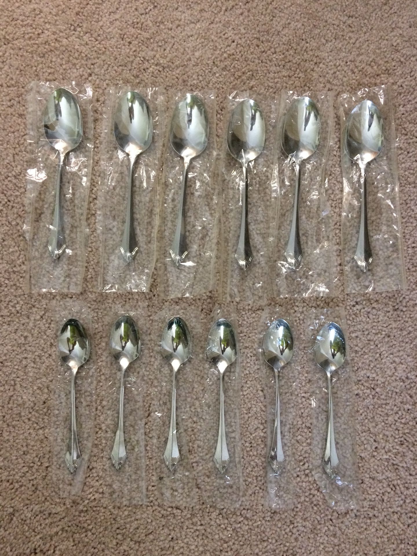 Six Tea Spoons and Serving Spoons in Belcourt (Silverplate) by Oneida