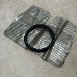 plastic car mats and  steering wheel cover never used
