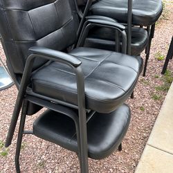 Black padded chairs for office or salon