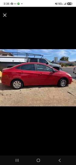 Red Hyundai Accent Sedan