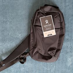 Daypack for a Hydro Flask bottle and gear.