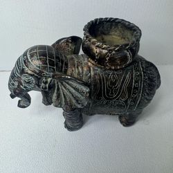 vintage or antique elephant candle holder