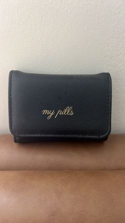 Miamica Snap Pill Case, a stylish and compact travel medicine organizer featuring a secure snap closure