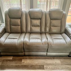 Ashley Furniture Leather Sofa & Love Seat with Dual Recliners - Charging Stations - Cup Holders