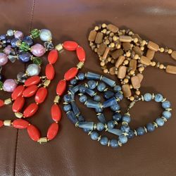 4  costume jewelry necklaces
