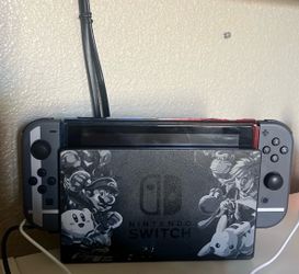 Nintendo Switch Limited Edition (Super Mario Bros) with charging dock