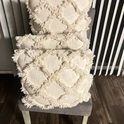 Three Beige pillows