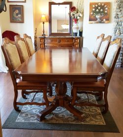 Stanley Cherry hand carved 7 pc dining room set with rare Aniline leather. 48x78 plus two 22” leaves