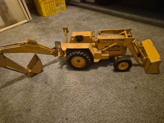 Ford tractor older says ertl on tire $40 firm