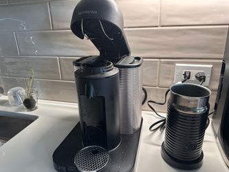 Nespresso coffee machine with milk frother