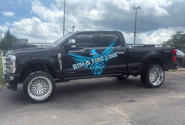 Ford f250 wheels and tires 24x14 with 33”