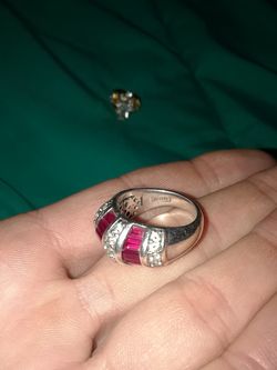 925 ring, not too sure what size it is, my guess would be a size 7?