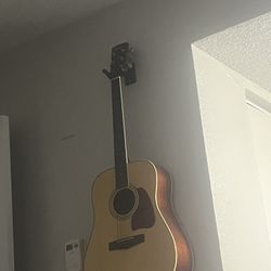 Guitar restrings, cleaning And setup.