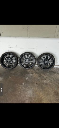 3 rims and tires