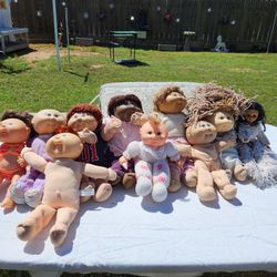9 Cabbage Patch Dolls 