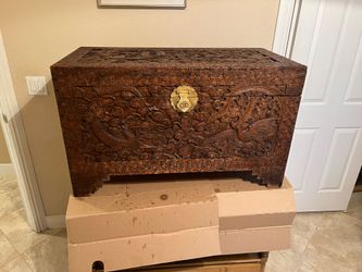 Hand carved oriental chest