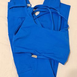 Bombshell sportswear, Brand: Bombshell sportswear  Includes: Sports bra + leggings (2-piece set) Condition:  Size: xe/s Color: royal blue and white   