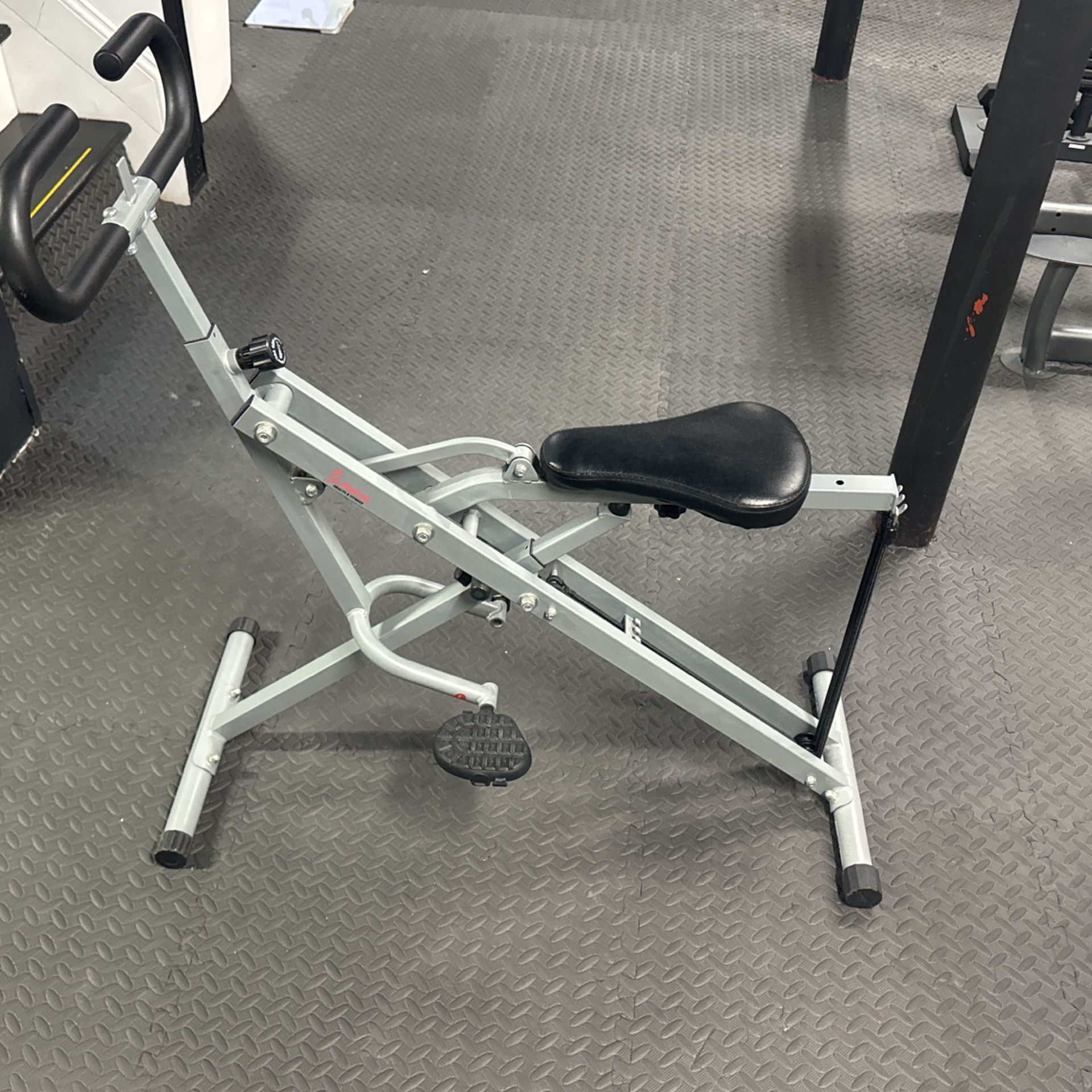 Sunny Health & Fitness Row-N-Ride Squat Assist Trainer for Glutes Workout With Adjustable Resistance, Easy Setup & Foldable Exercise Equipment, Glute
