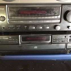 Receiver cd player by Kenwood and two speakers by Pioneer