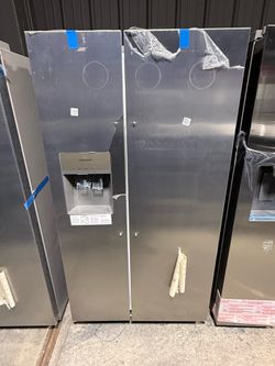 Brand new Frigidaire Stainless steel side by side refrigerator