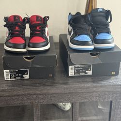 2 Pairs Of Jordans